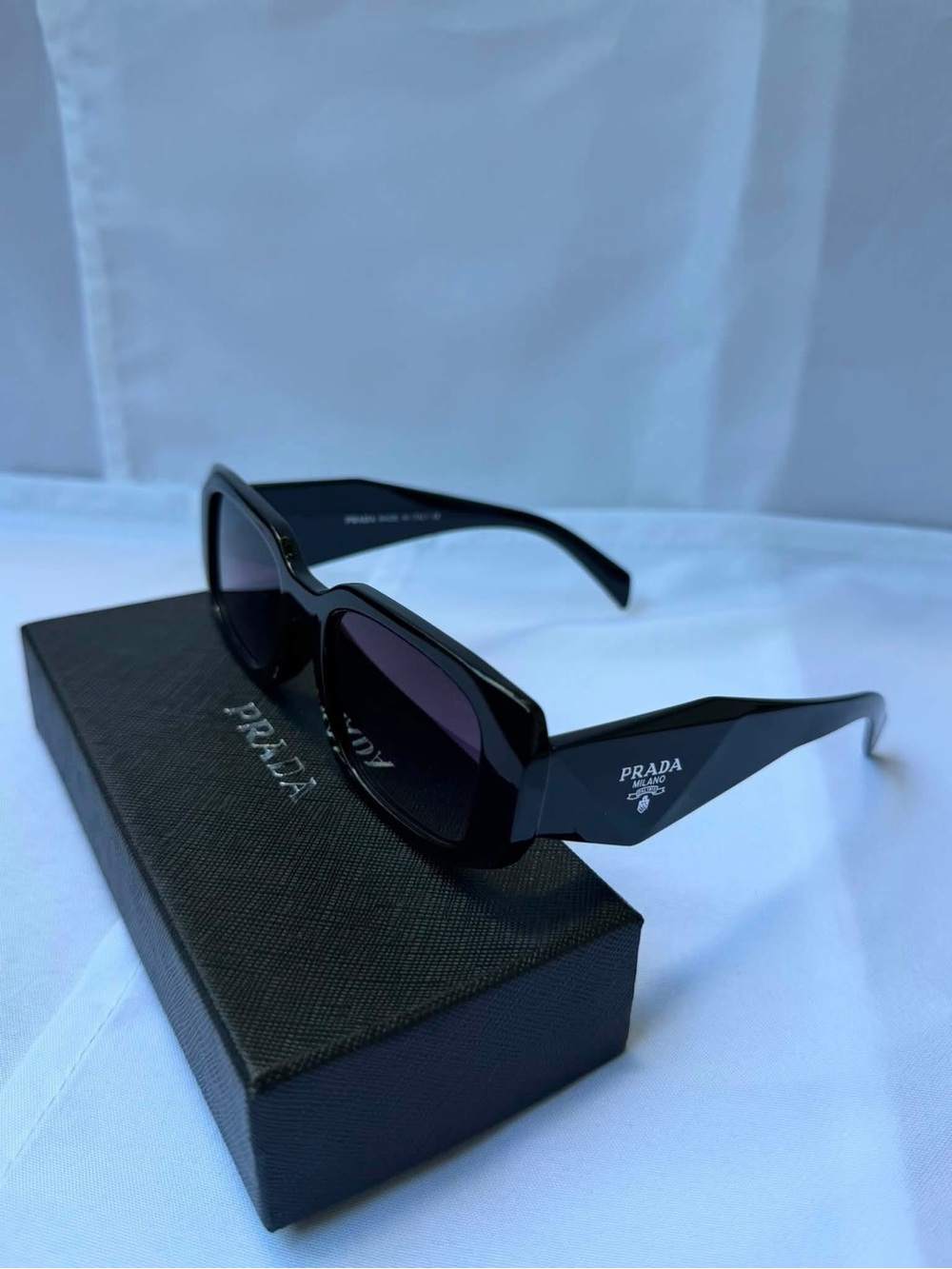 Prada Black Woman's Rectangular Sunglasses with Dark Lenses